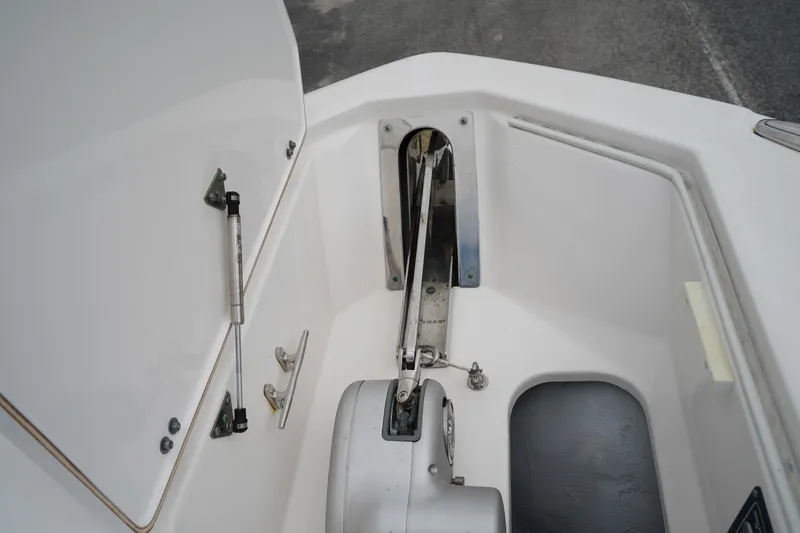 Slide: The Image of 2020 Sea Fox 328 Commander anchor compartment with open hatch and hydraulic support. - 66