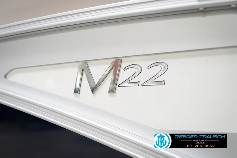 Slide: The Image of 2026 Bennington 22 ML boat emblem with Reeder-Trausch Marine logo. - 118