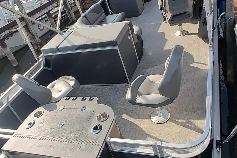 Slide: The Image of 2023 Tahoe Pontoon LTZ Rear Fish 22' with spacious seating and fishing amenities. - 7