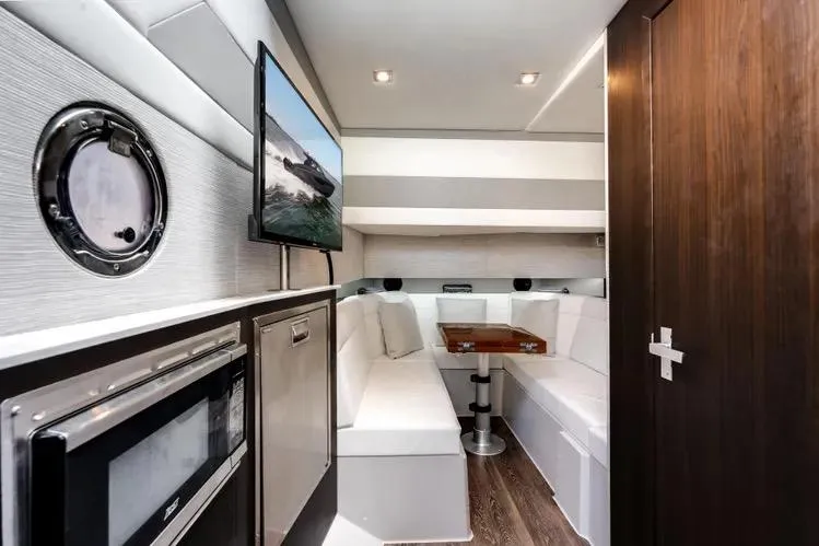 Slide: The Image of Luxurious interior of 2023 Cruisers 42 GLS OB yacht with modern amenities. - 43