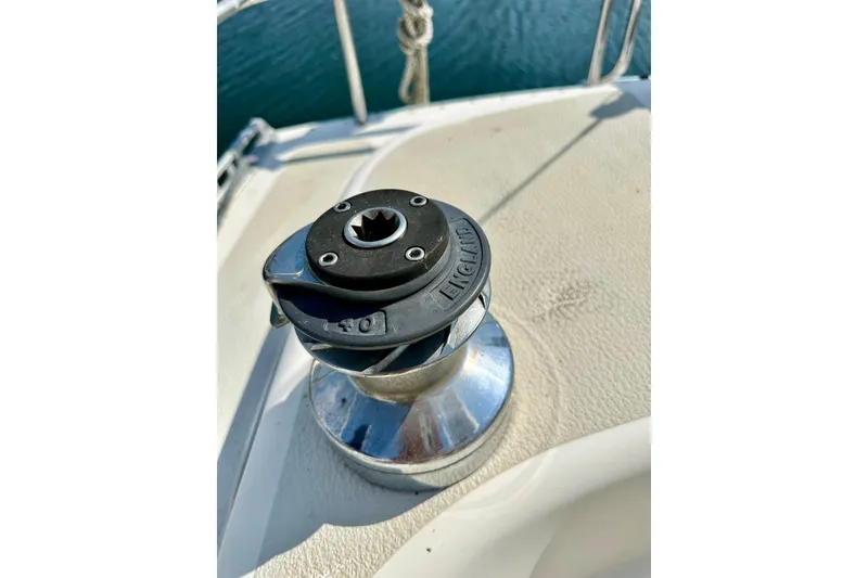 Slide: The Image of Winch on 1983 Sirena 38 sailboat deck, close-up view. - 33