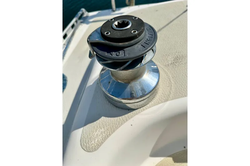 Slide: The Image of Winch on 1983 Sirena 38 sailboat deck, close-up view. - 34