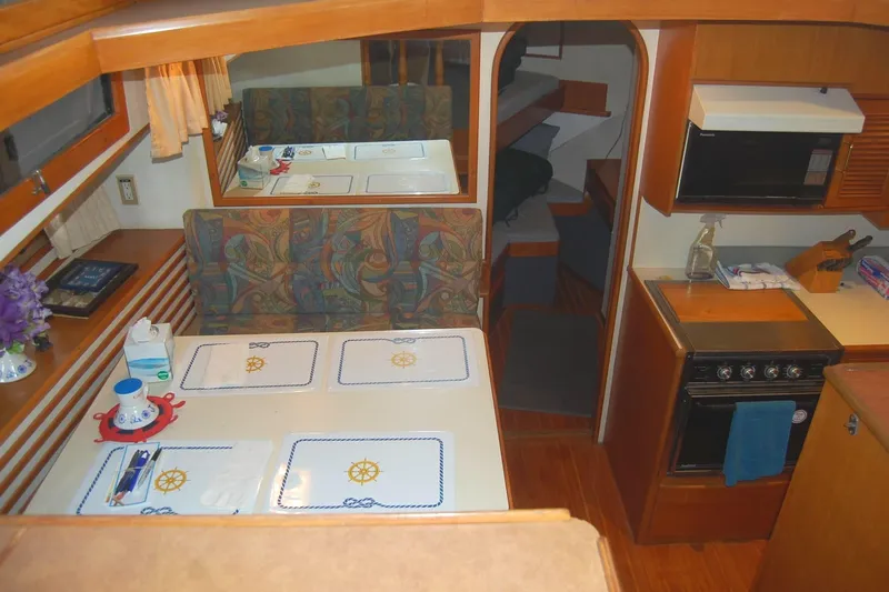 Slide: The Image of Galley view from salon with dining area, galley. - 11