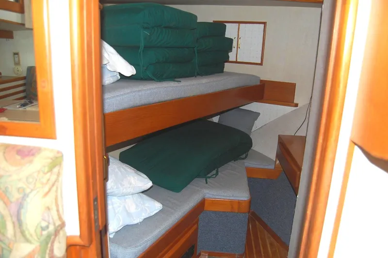 Slide: The Image of Forward Stateroom with bunks, vanity, and hanging locker - 22