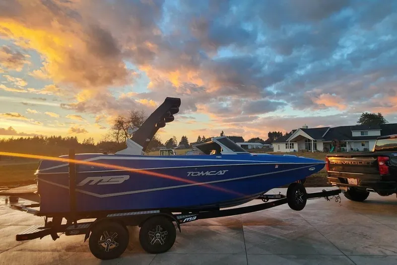 Slide: The Image of Blue MB F21 Tomcat boat on trailer at sunset, 2017 model. - 9