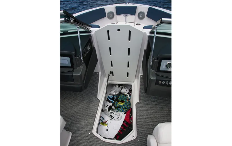 Slide: The Image of 2013 Four Winns H210 boat interior storage compartment with gear. - 3