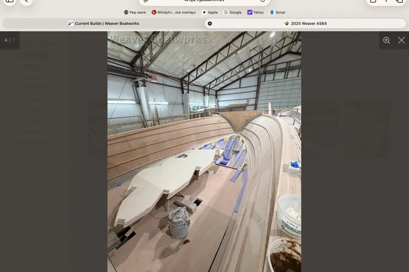 Slide: The Image of Construction of a 2026 Weaver Sportfish in a boatyard. - 7