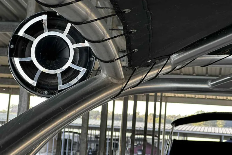 Slide: The Image of Close-up of a speaker on a 2014 Bennington 2875 QCW I/O boat. - 11