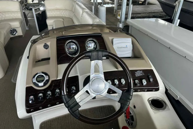 Slide: The Image of 2014 Bennington 2875 QCW I/O boat detail with model number visible. - 5
