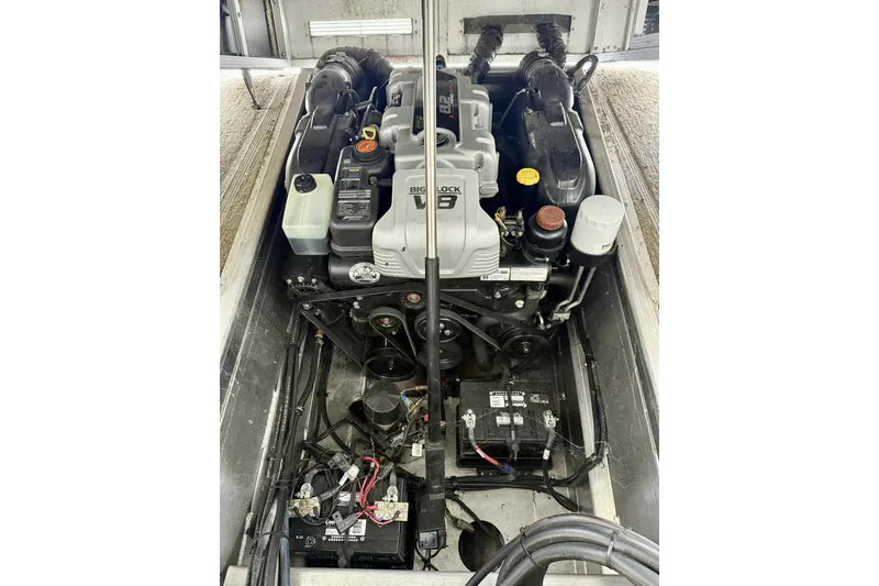 Slide: The Image of Engine compartment of a 2014 Bennington 2875 QCW I/O boat, featuring a Big Block V8 engine. - 8