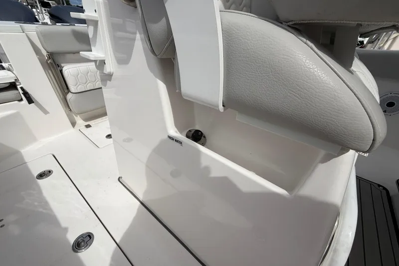 Slide: The Image of 2021 Sea Fox 288 Commander boat interior with seating and storage compartment. - 21
