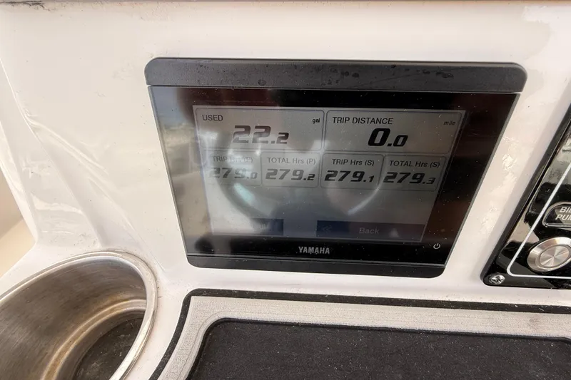 Slide: The Image of Yamaha display on 2021 Sea Fox 288 Commander showing fuel usage and trip hours. - 24