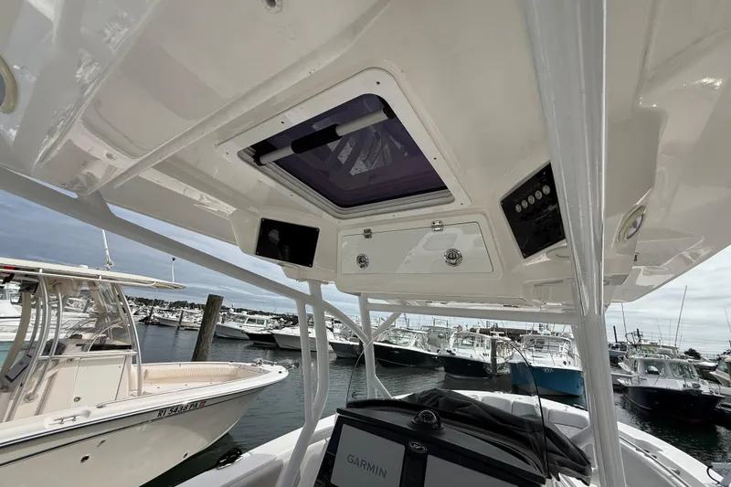 Slide: The Image of 2021 Sea Fox 288 Commander boat interior with electronics, docked at marina. - 26