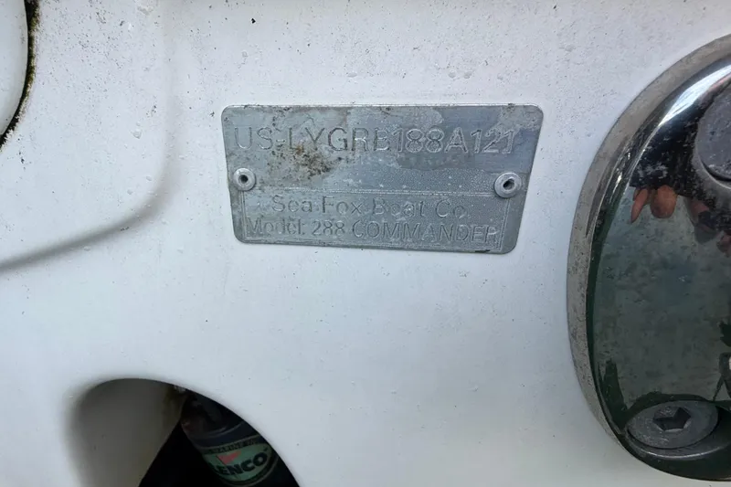 Slide: The Image of 2021 Sea Fox 288 Commander identification plate on boat hull. - 42