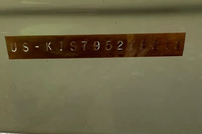 Slide: The Image of Serial number "US-KIS79527E212" on a 2012 195 SS vehicle. - 12