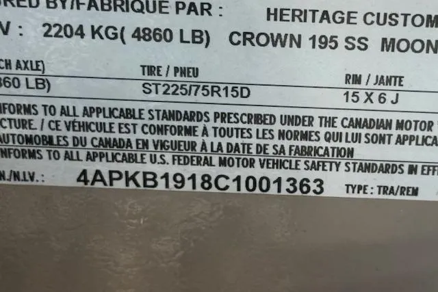 Slide: The Image of Label displaying vehicle specifications and compliance details for a 2012 Crown 195 SS. - 13