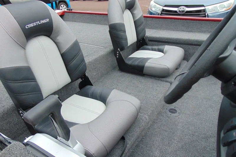 Slide: The Image of 2026 Crestliner 1700 Storm boat interior with gray and black seating. - 5