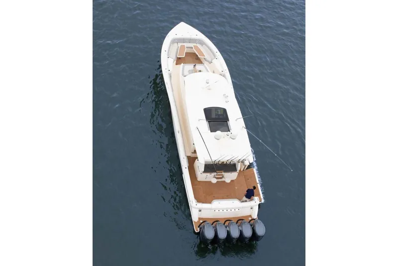 Slide: The Image of Manufacturer Provided Image: Aerial view of 2025 Scout 530 LXF luxury boat on water. - 6
