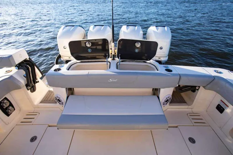 Slide: The Image of Manufacturer Provided Image: 2025 Scout 425 LXF boat with triple outboard engines on the water. - 10