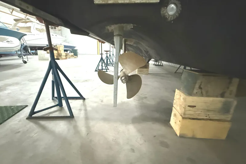 Slide: The Image of 2006 Tiara Yachts 3800 Open propeller and hull in dry dock. - 11