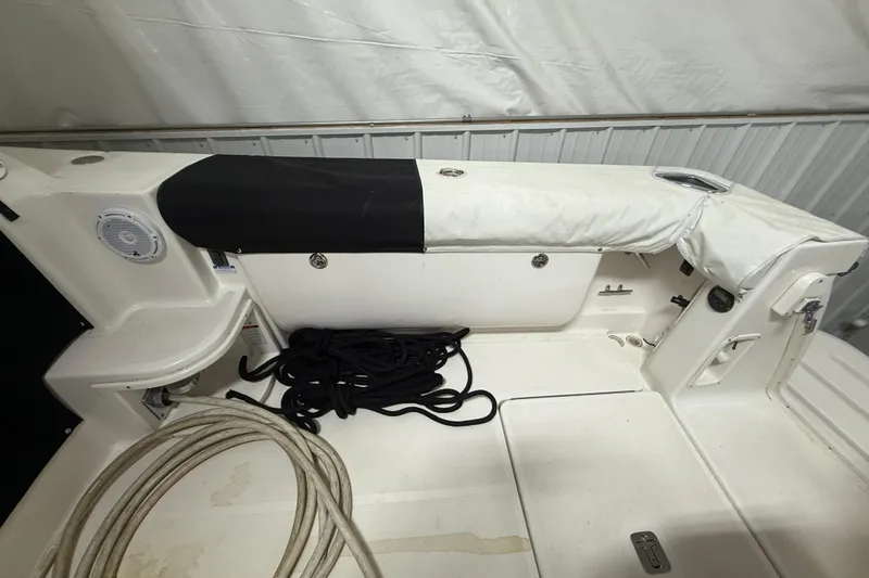 Slide: The Image of 2006 Tiara Yachts 3800 Open deck with ropes and covered seating area. - 14