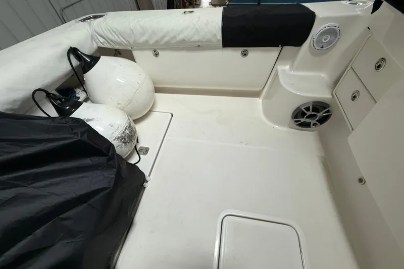 Slide: The Image of 2006 Tiara Yachts 3800 Open deck with fenders and storage compartments. - 15