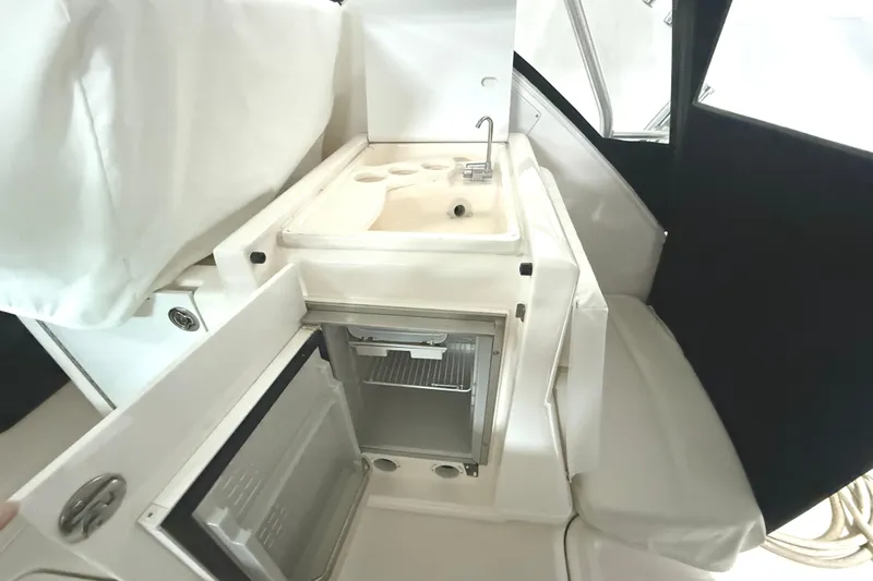 Slide: The Image of 2006 Tiara Yachts 3800 Open interior with sink and mini fridge. - 19