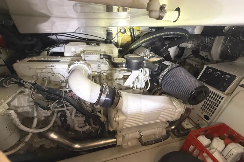 Slide: The Image of Engine compartment of a 2006 Tiara Yachts 3800 Open, showcasing detailed mechanical components. - 39