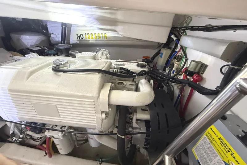 Slide: The Image of Engine room of a 2006 Tiara Yachts 3800 Open, showcasing detailed mechanical components. - 43