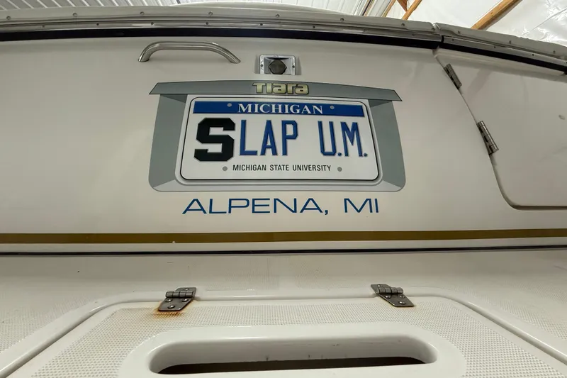 Slide: The Image of 2006 Tiara Yachts 3800 Open with Michigan-themed license plate, Alpena, MI. - 8
