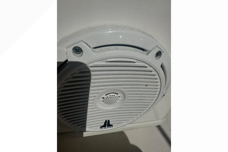 Slide: The Image of Close-up of a JL Audio speaker on a 2023 Boston Whaler 150 Montauk boat. - 12