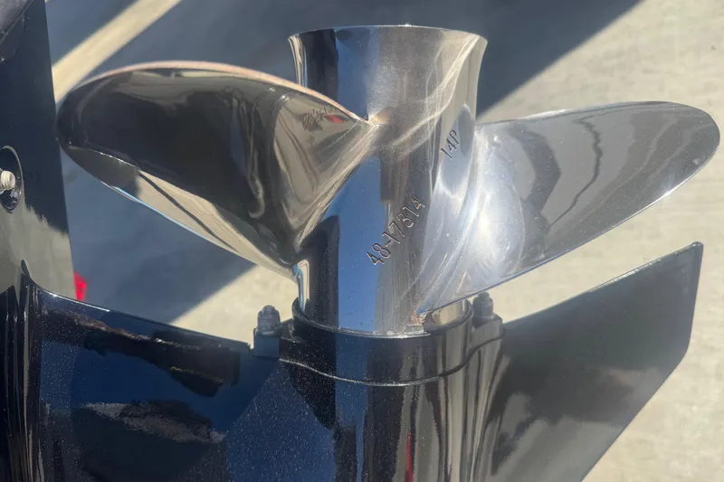Slide: The Image of Close-up of a shiny boat propeller on a 2023 Boston Whaler 150 Montauk. - 20