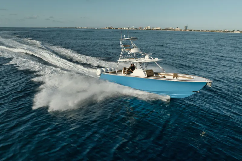 Slide: The Image of 2023 Valhalla Boatworks V-41 cruising swiftly on open ocean waters. - 2