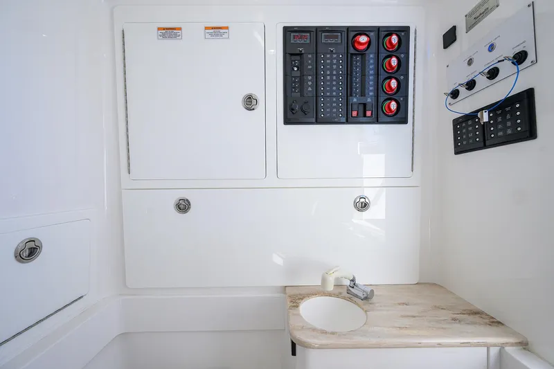 Slide: The Image of 2023 Valhalla Boatworks V-41 control panel and sink area, featuring modern design and functionality. - 26