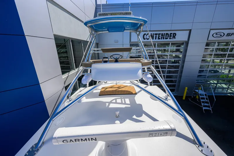 Slide: The Image of 2023 Valhalla Boatworks V-41 with Garmin radar, docked near modern building. - 9