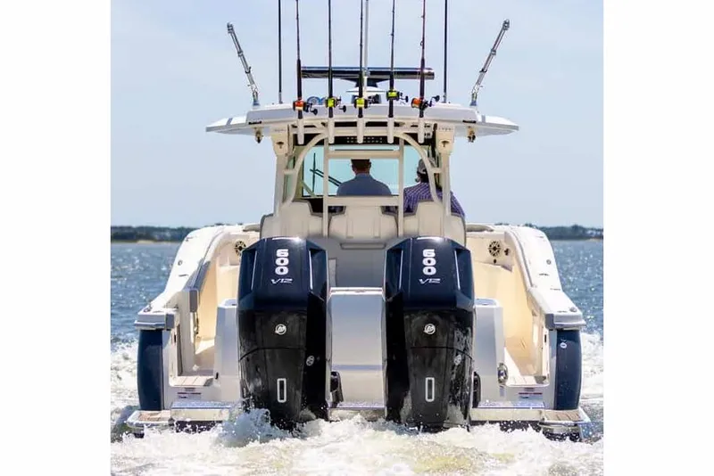 Slide: The Image of Manufacturer Provided Image: 2025 Scout 400 LXF boat with dual 500 V12 engines on the water. - 4