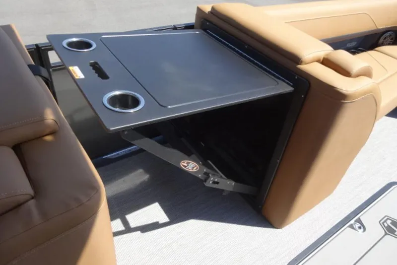 Slide: The Image of 2026 Harris Solstice 250 boat interior with foldable table and cup holders. - 5