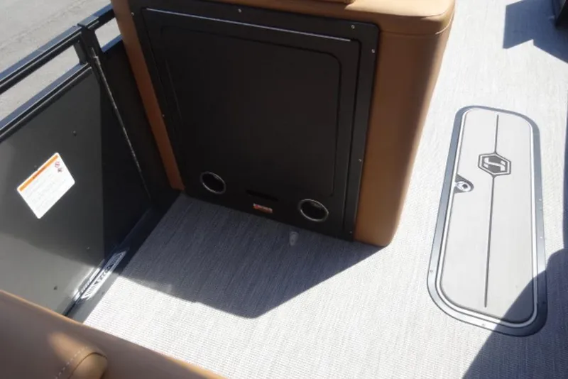 Slide: The Image of Interior of 2026 Harris Solstice 250 boat, featuring seating and storage compartment. - 6