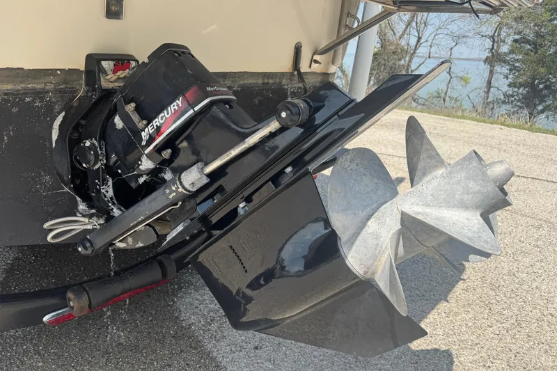 Slide: The Image of 2003 Crownline 262 CR boat with Mercury outboard motor and propeller detail. - 10