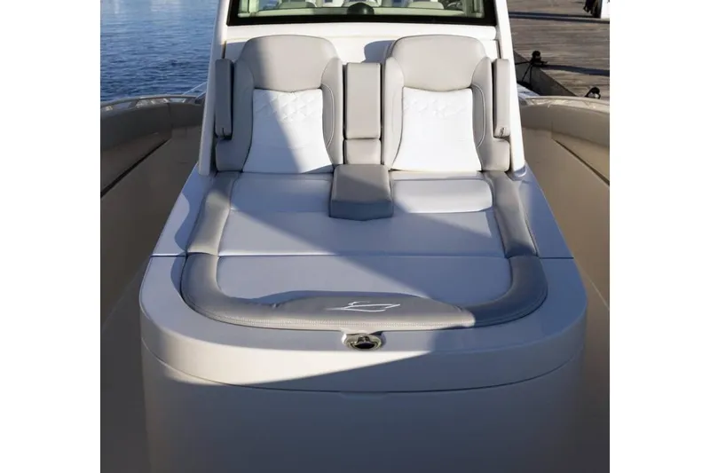 Slide: The Image of Manufacturer Provided Image: 2025 Scout 357 LXF boat with luxurious seating and sleek design. - 5