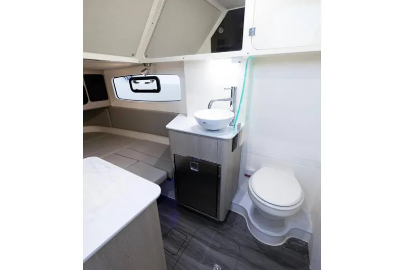 Slide: The Image of Manufacturer Provided Image: 2025 Scout 357 LXF cabin interior with modern bathroom and compact design. - 9