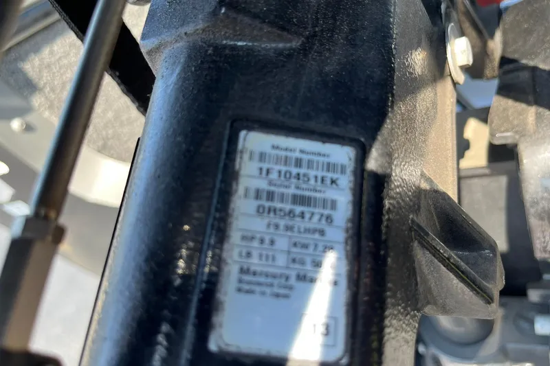 Slide: The Image of Close-up of a 2013 Lund 1875 Pro-V IFS model number label. - 30