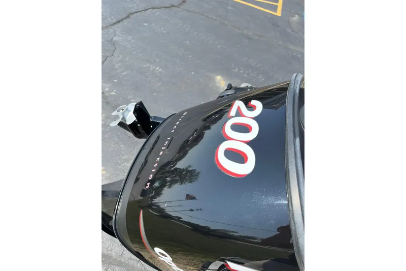 Slide: The Image of Outboard motor on 2013 Lund 1875 Pro-V IFS boat, featuring "200" horsepower. - 36