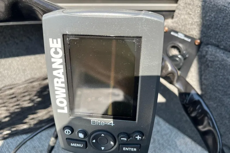 Slide: The Image of Lowrance Elite-4 fish finder on 2013 Lund 1875 Pro-V IFS boat dashboard. - 38
