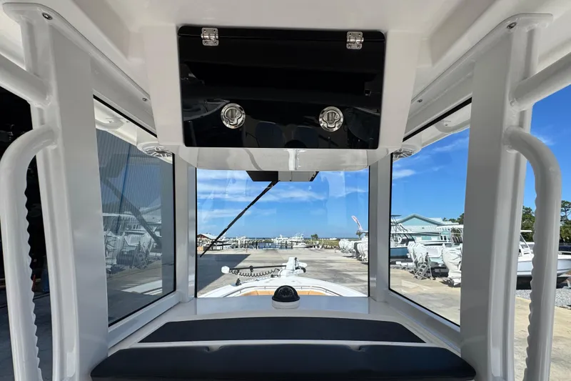 Slide: The Image of 2026 Caymas 291 boat interior with panoramic windows and sleek design. - 19