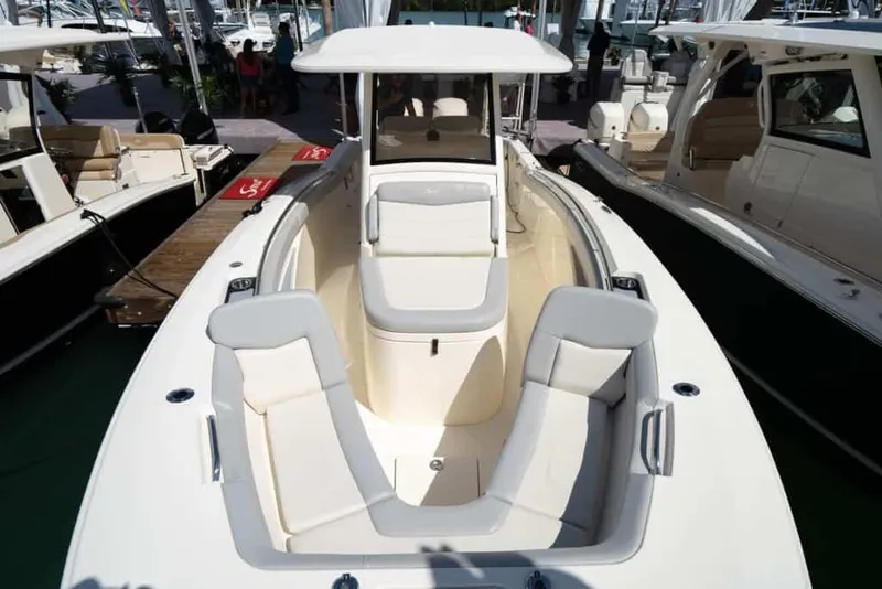 Slide: The Image of Manufacturer Provided Image: 2025 Scout 305 LXF boat with spacious seating and sleek design. - 5