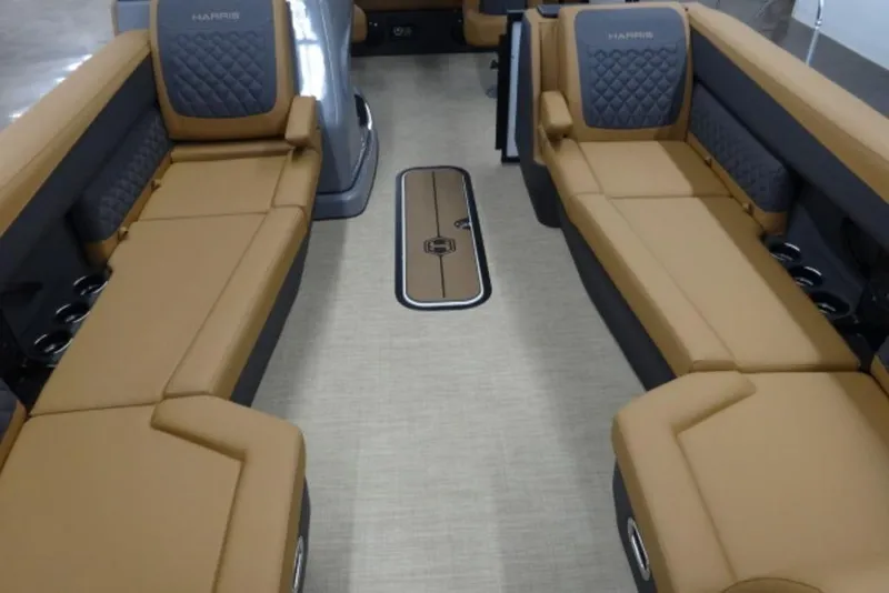 Slide: The Image of 2026 Harris Sunliner 250 interior with tan and gray seating, modern design. - 8
