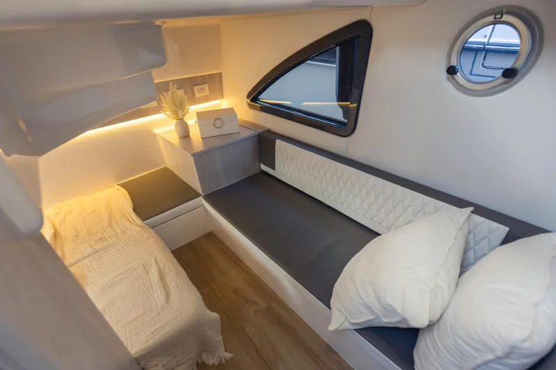 Slide: The Image of Modern interior of Hanover 387, 2025 model, featuring cozy seating and ambient lighting. - 24