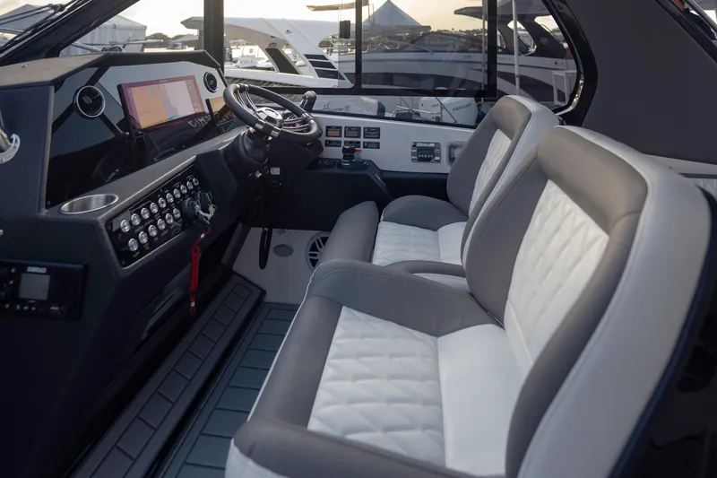 Slide: The Image of Interior of 2025 Hanover 387 boat with modern dashboard and luxurious seating. - 7