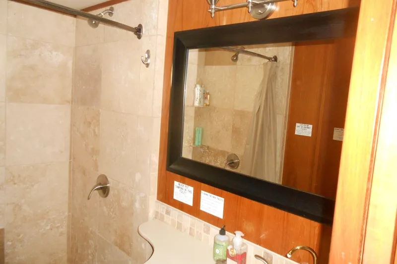 Slide: The Image of Bathroom interior of 1988 Lazy Days houseboat with mirror and shower. - 22